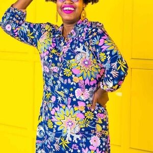 ModCloth applaud for psychadelic retro print shirt dress